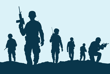 Silhouette of soldiers with guns walking and patrolling on battlefield