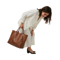 Woman holding brown leather tote bag isolated on a transparent background image