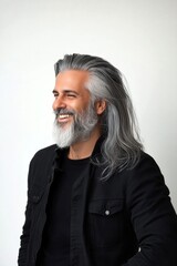 A confident and modern man embracing his look. Pure white solid background. Classy men's undercut haircut - midlife middle eastern man with long hair. Idea of style for aging men.