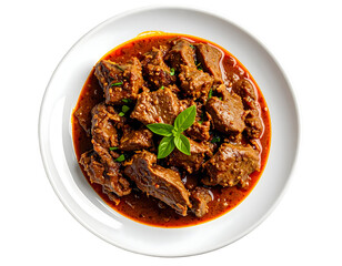 Beef stew with basil on plate
