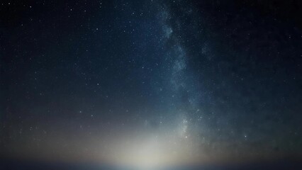 Fototapeta premium Vast Starry Night Sky with Milky Way and Distant Horizon Glow