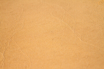 Golden sand texture on beach