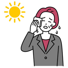 熱中症になる中年のスーツの女性