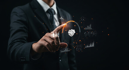 Businessman interacting with a digital interface displaying data visualizations and a handshake icon