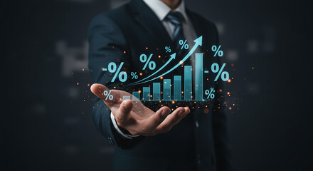 Businessman holding holographic graph with percentage signs showing growth and financial success