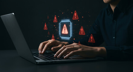 Person typing on laptop with floating warning signs and chip icon in a dark background