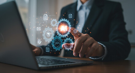 A person interacting with digital gears. The image suggests technology and connectivity