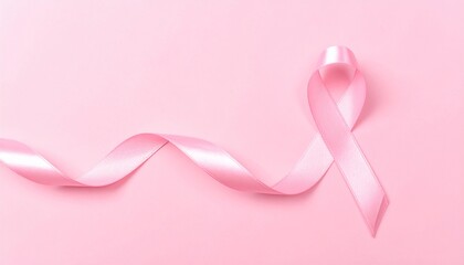 Isolated Pink ribbon on Soft Pink Background with Copyspace