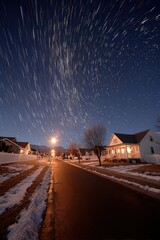Captivating Night Sky Star Trails over Suburban Winter Neighborhood with Dynamic Celestial Motion
