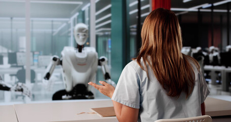 Young Woman In Medical Uniform Interviewing