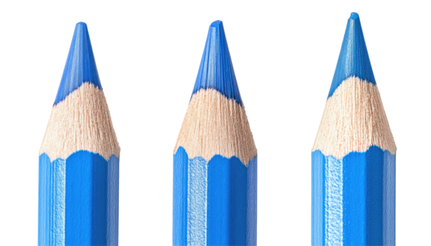 Three sharpened blue colored pencils aligned, showcasing their vibrant color and pointed tips for artistic use.