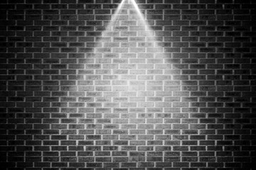 Grey brick wall under spotlight