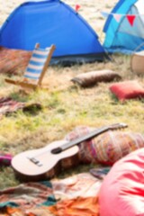 Tents by guitars and chairs