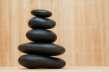 Stones against wooden wall