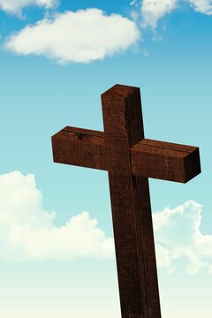 Fototapeta Flat design wooden Latin cross is standing against clear blue sky with scattered white clouds