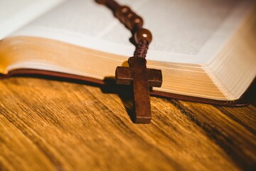 Rosary beads on open bible