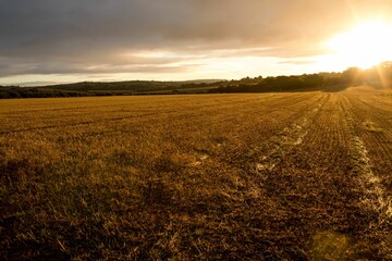 View of the countryside against sunset
