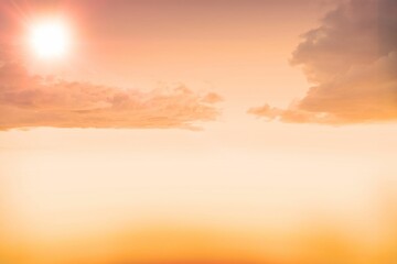 Scenic view of sun and clouds in sky