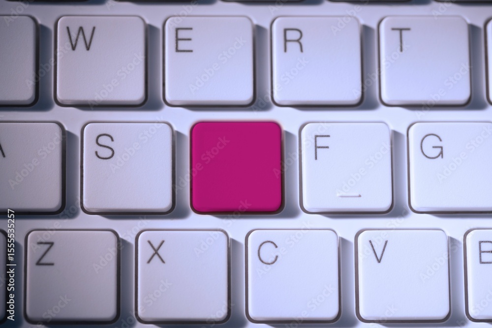 Aufkleber digital composite of pink key on keyboard