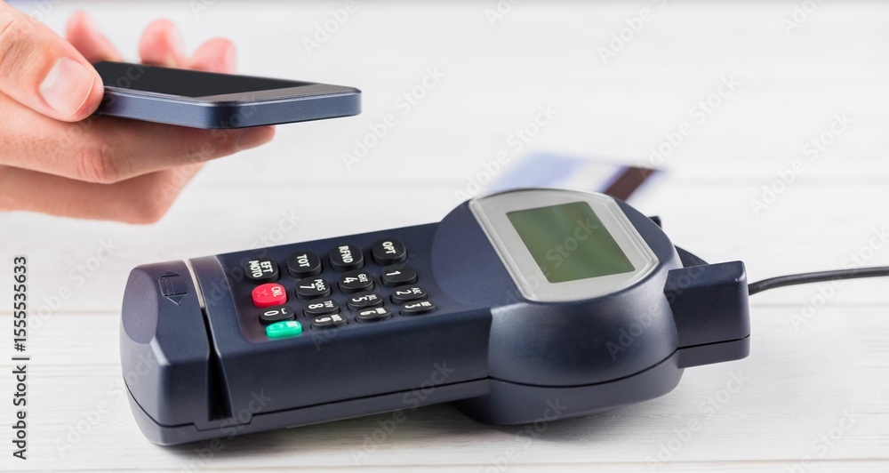 Poster flat design pos terminal is resting on light wood surface with card inserted and smartphone tapping