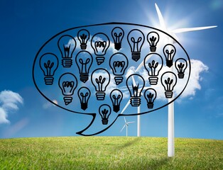 Light bulbs graphic on bright countryside with wind turbines