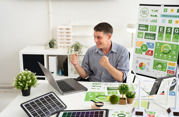 People in Modern corporate work on renewable energy to representing ESG Enviromental, Social,...