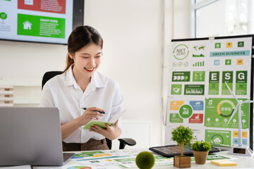 Businesswoman working on Save the Earth. ESG concept. Sustainable ecology and environment...