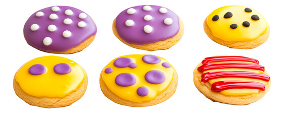Fototapeta premium Delightful assortment of frosted cookies in yellow, purple, and red, showcasing playful polka dot designs against a clean transparent background.