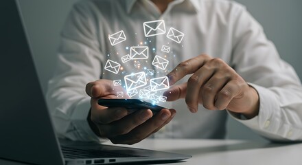 Close up hand touch smartphone with message or email alert sign icon pop up. It can use for Efficient Email Management Mobile & Laptop Integration for Seamless Communication phto concept