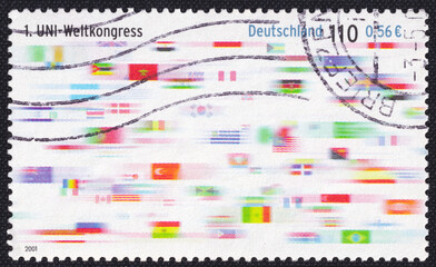 Flags of the countries participating in the First World Congress of Union Network International in Berlin on a 2001 Germany vintage postage stamp