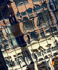 Abstract image from reflection of buildings in water for use as a background texture