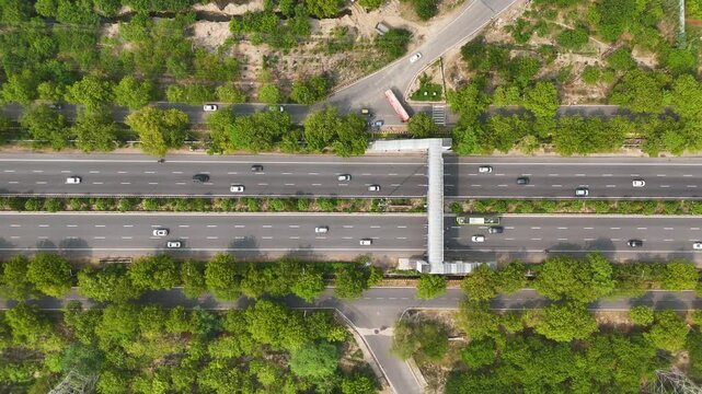 Top-down aerial shot of traffic patterns and intersections from above.
