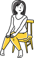 座って何かを見ている女性