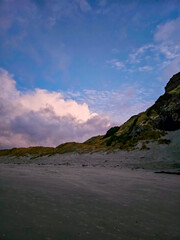 Aramoana Beach near Dunedin, New Zealand, during sunset / dusk