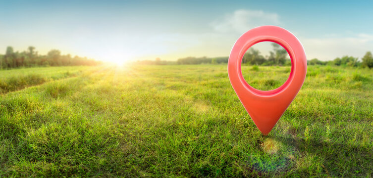 Land for sale with location pin icon on earth and green grass in real estate sale or property investment concept, Buying new home for family - 3d of big advertising sign. Land plot management.