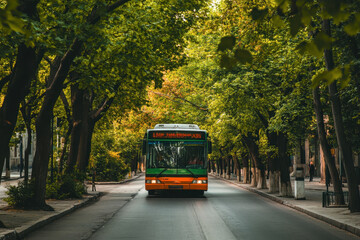 Fototapeta premium Tourist bus navigates through scenic tree-lined road in vibrant autumn landscape surrounded by nature's beauty and tranquility