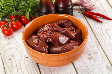 Raw chicken liver uncooked in the bowl