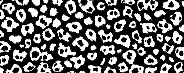 Repeating leopard print pattern with bold black spots over a white and gray fur textured background in a modern and graphic seamless style for textiles