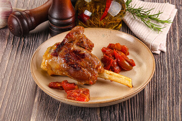 Baked lamb shank with vegetables