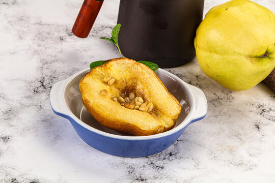 Baked quince with honey and cedar