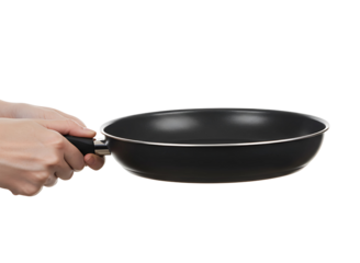 Hand holding a black frying pan for cooking food isolated on transparent background