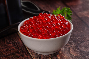 Salmon red caviar in the bowl