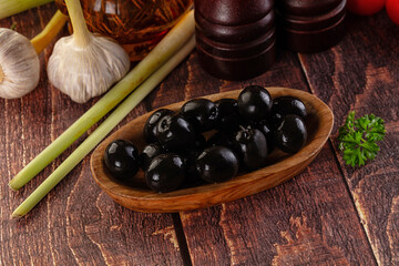 Mediterranean marinated Black olives in the bowl