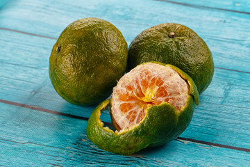 Ripe green organic orange citrus