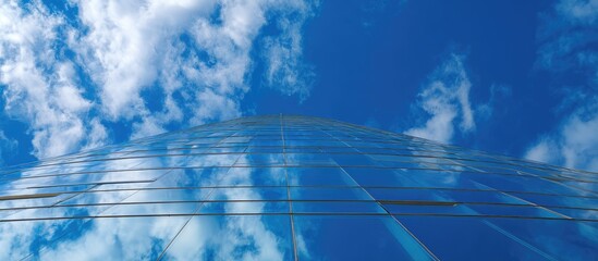 Modern skyscraper against a clear blue sky