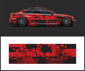 Aggressive Red and Black Car Wrap Design sporty
