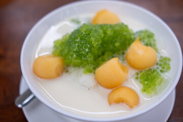Sago cantaloupe with coconut milk, Thai dessert served in a bowl