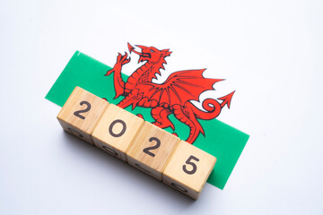 2025, Wales, Wales flag with date block, Concept, Important events for Wales in the new year, election, economy, social activities, central bank, Wales foreign policy