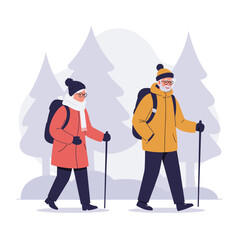 Elderly couple hiking in winter gear through snowy forest  