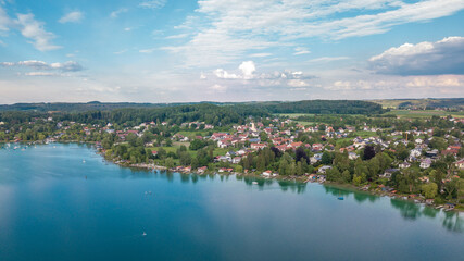 Aerial view over W&ouml;rthsee, beautiful lake with small docks in Bayern, Germany.